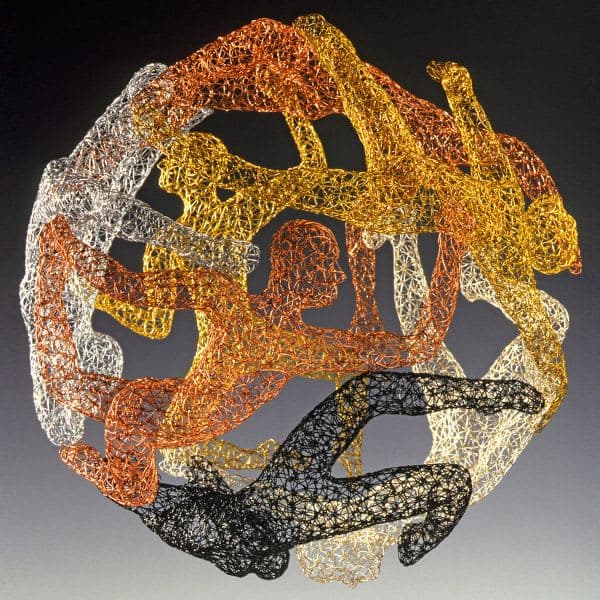 A sculpture made out of various colored wire