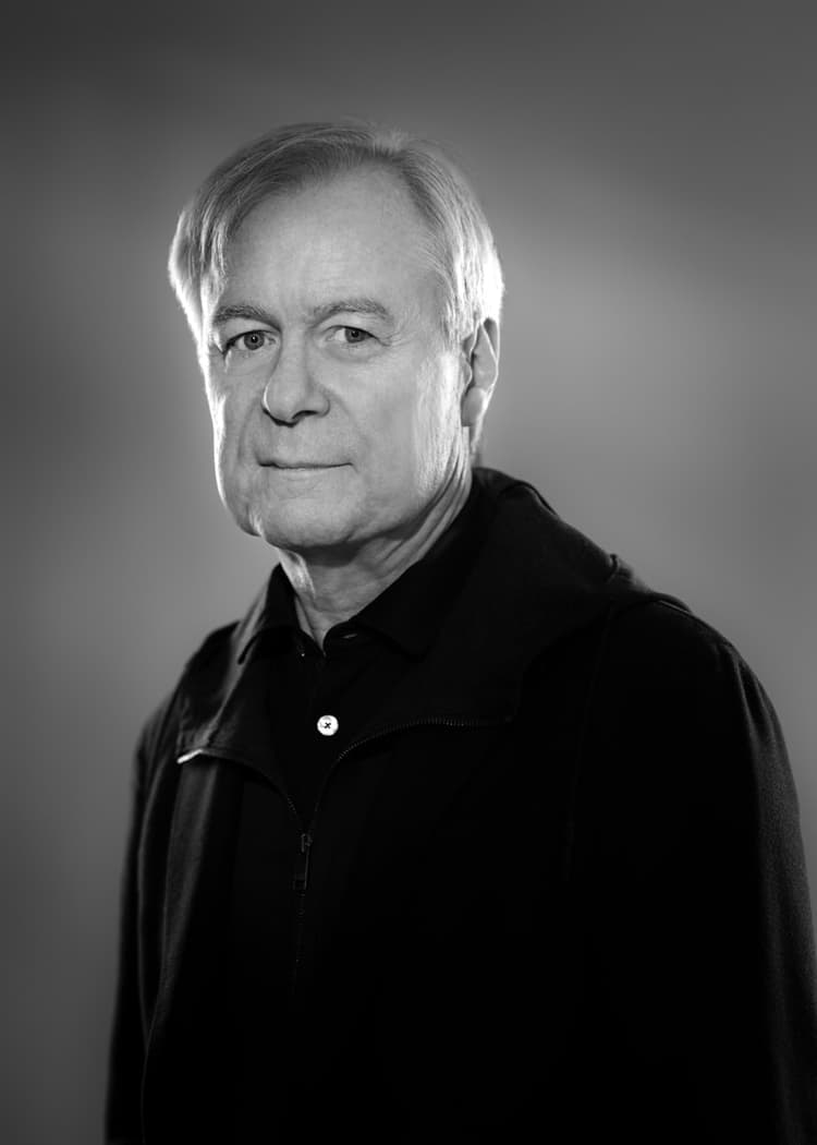 A black and white photo of a man