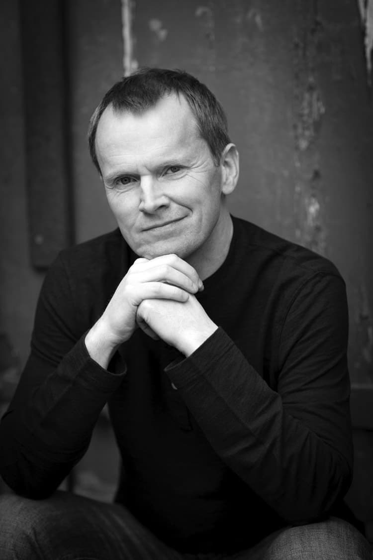 A black and white photo of a man