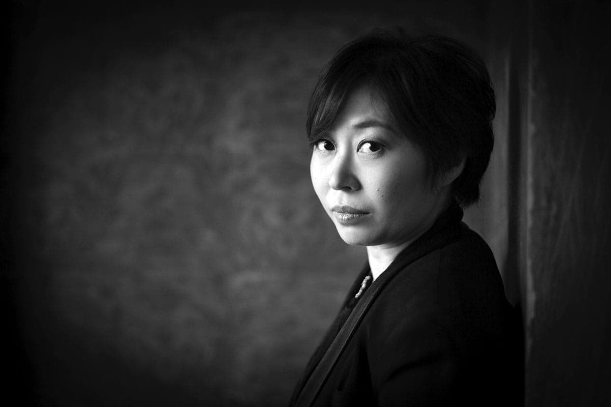 A black and white photo of a woman