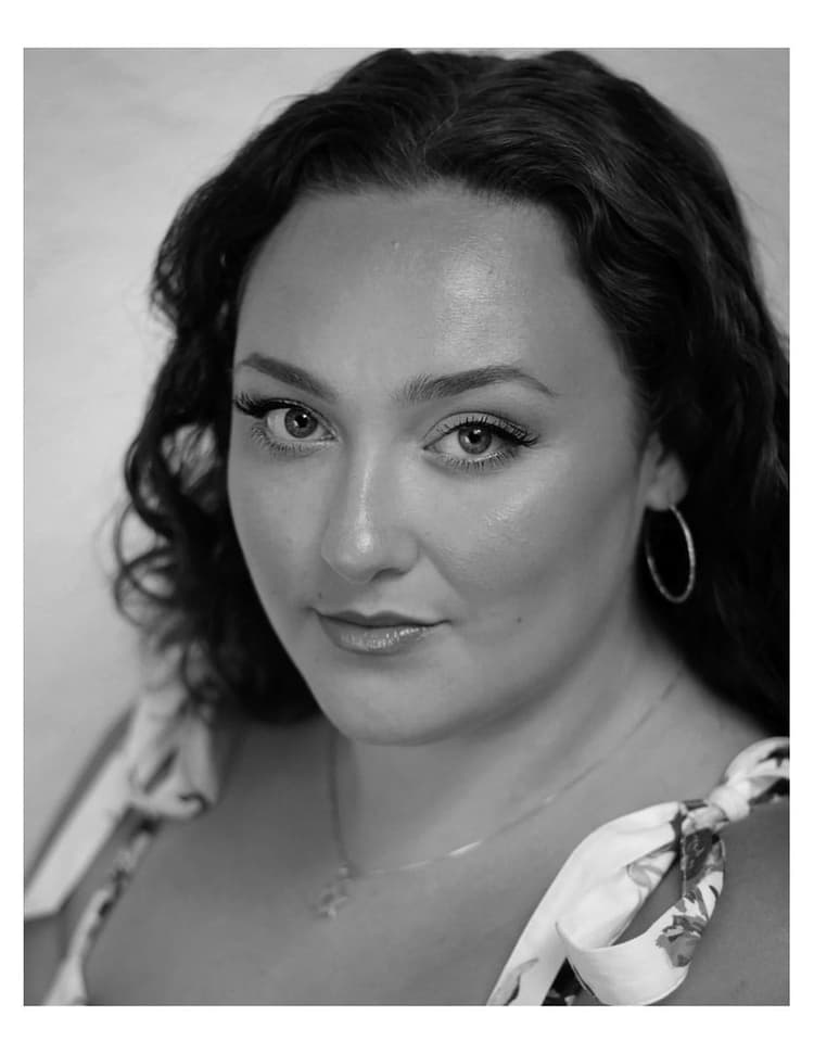 A black and white photo of a woman