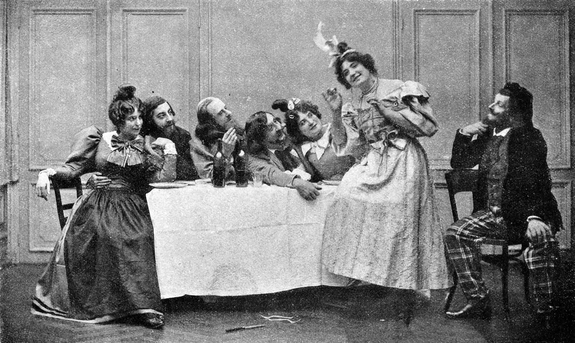 A group of people sitting around a table