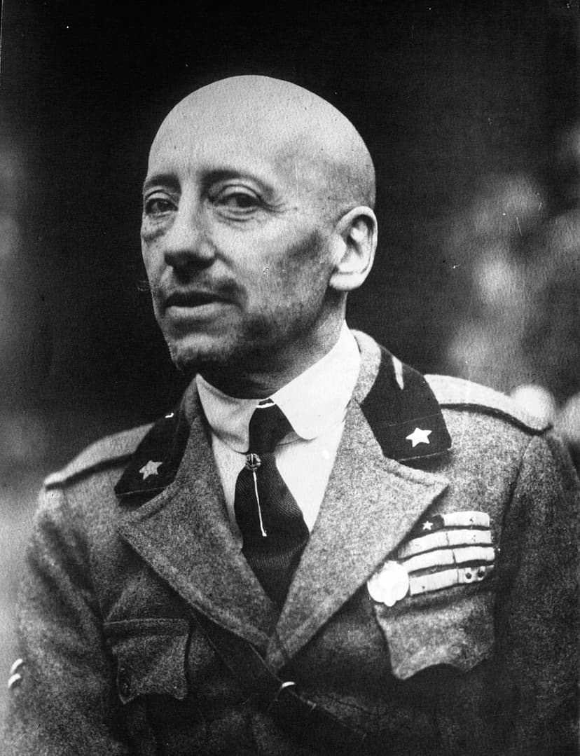 A black and white photo of a man in uniform