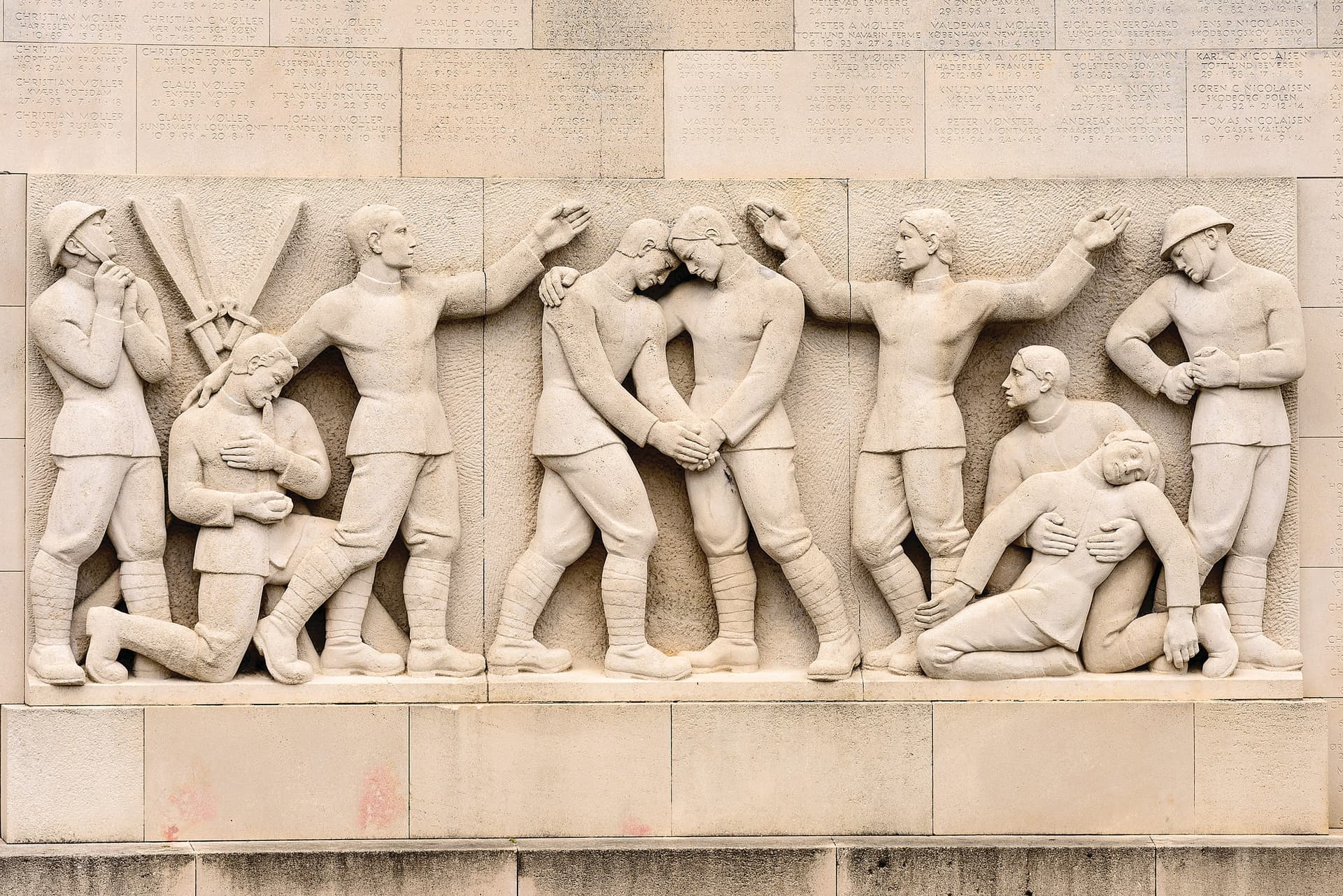 A sculpture of a group of men holding baseball bats