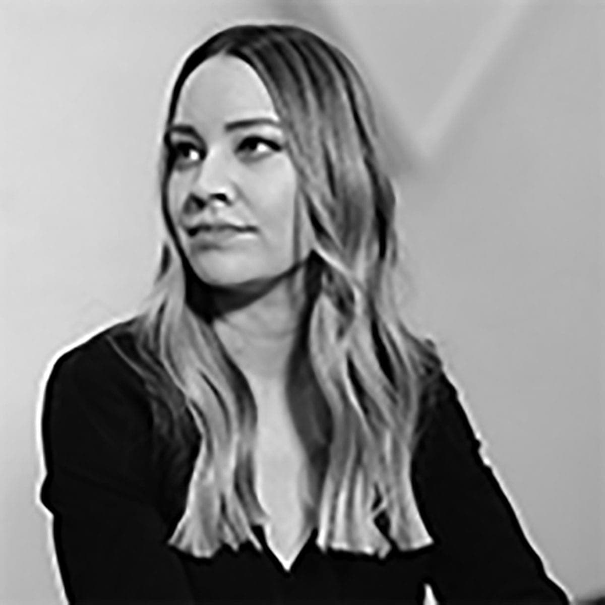 A black and white photo of a woman with long hair