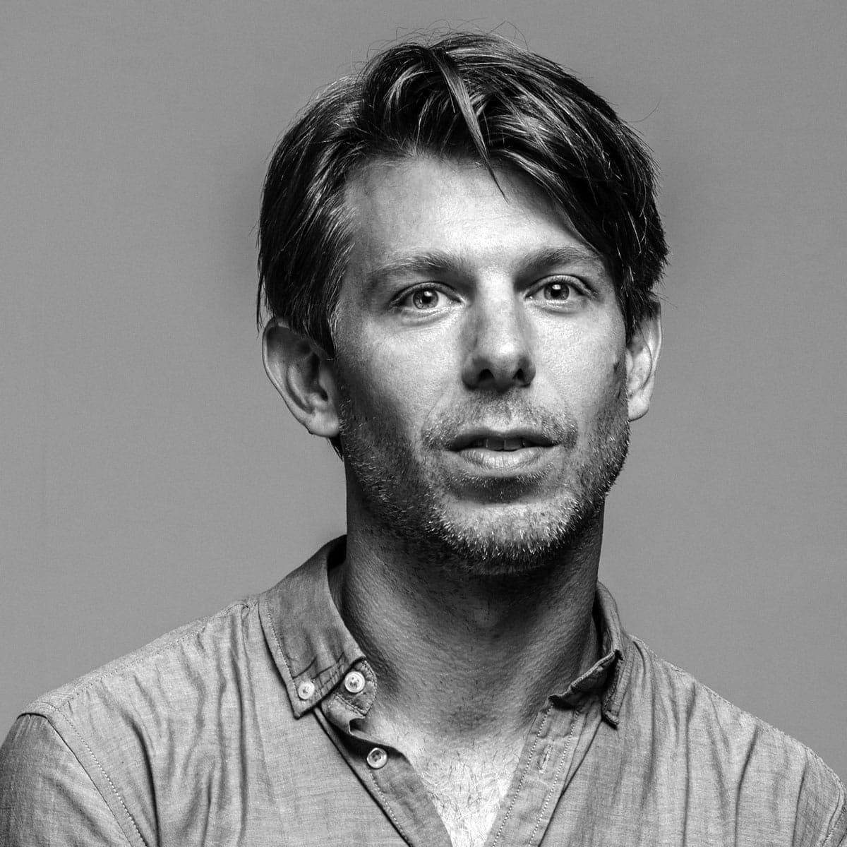 A black and white photo of a man