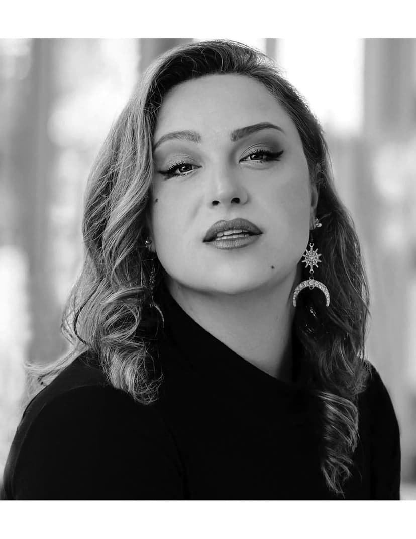 A black and white photo of a woman