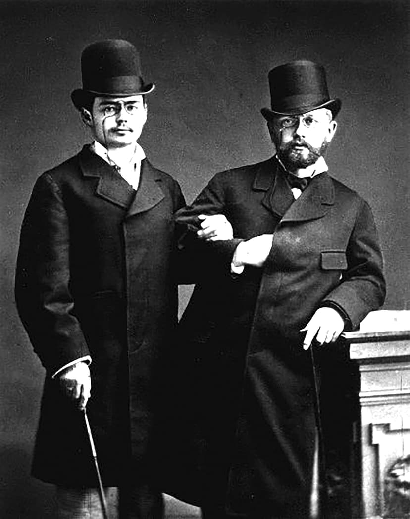 A couple of men standing next to each other