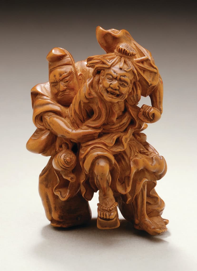 A statue of two people holding each other