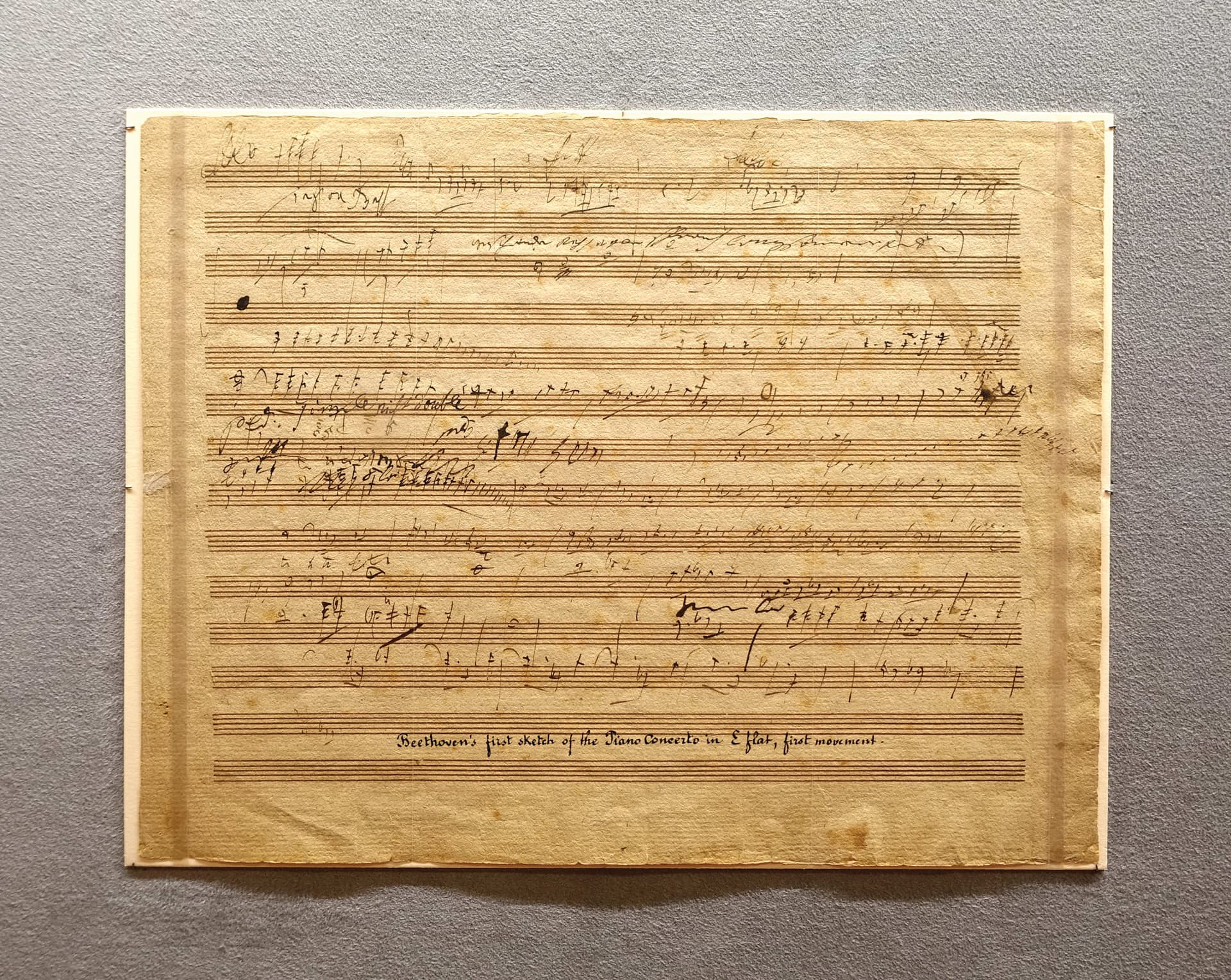An old sheet of music with writing on it