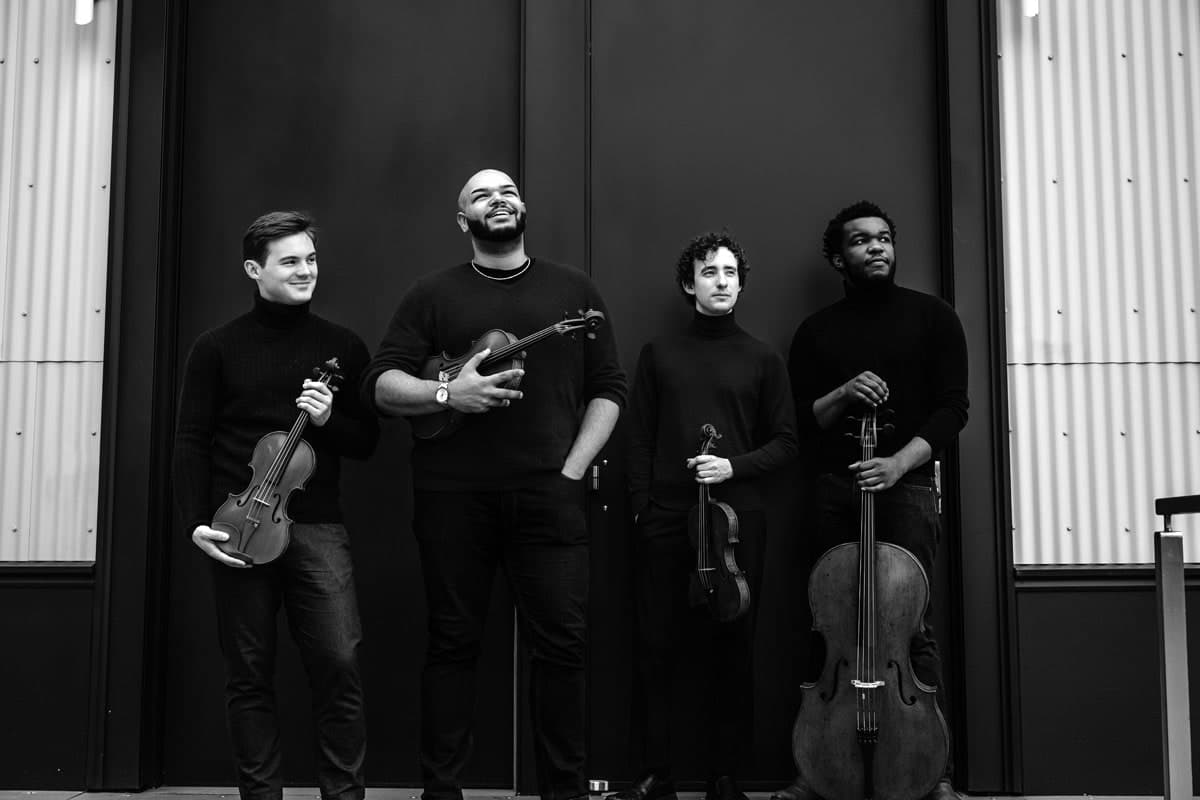 A group of men standing next to each other